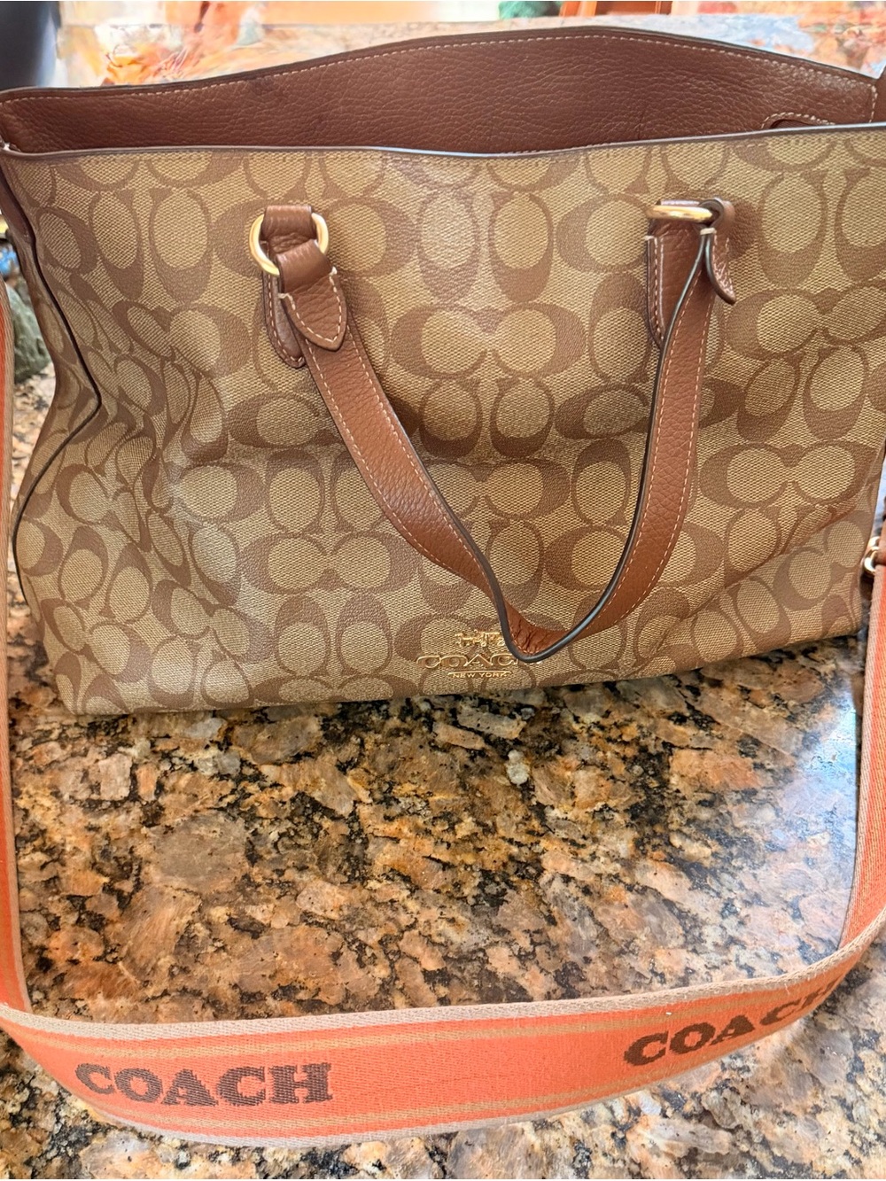 Coach Brown Signature Canvas Tote with Orange Branded Strap